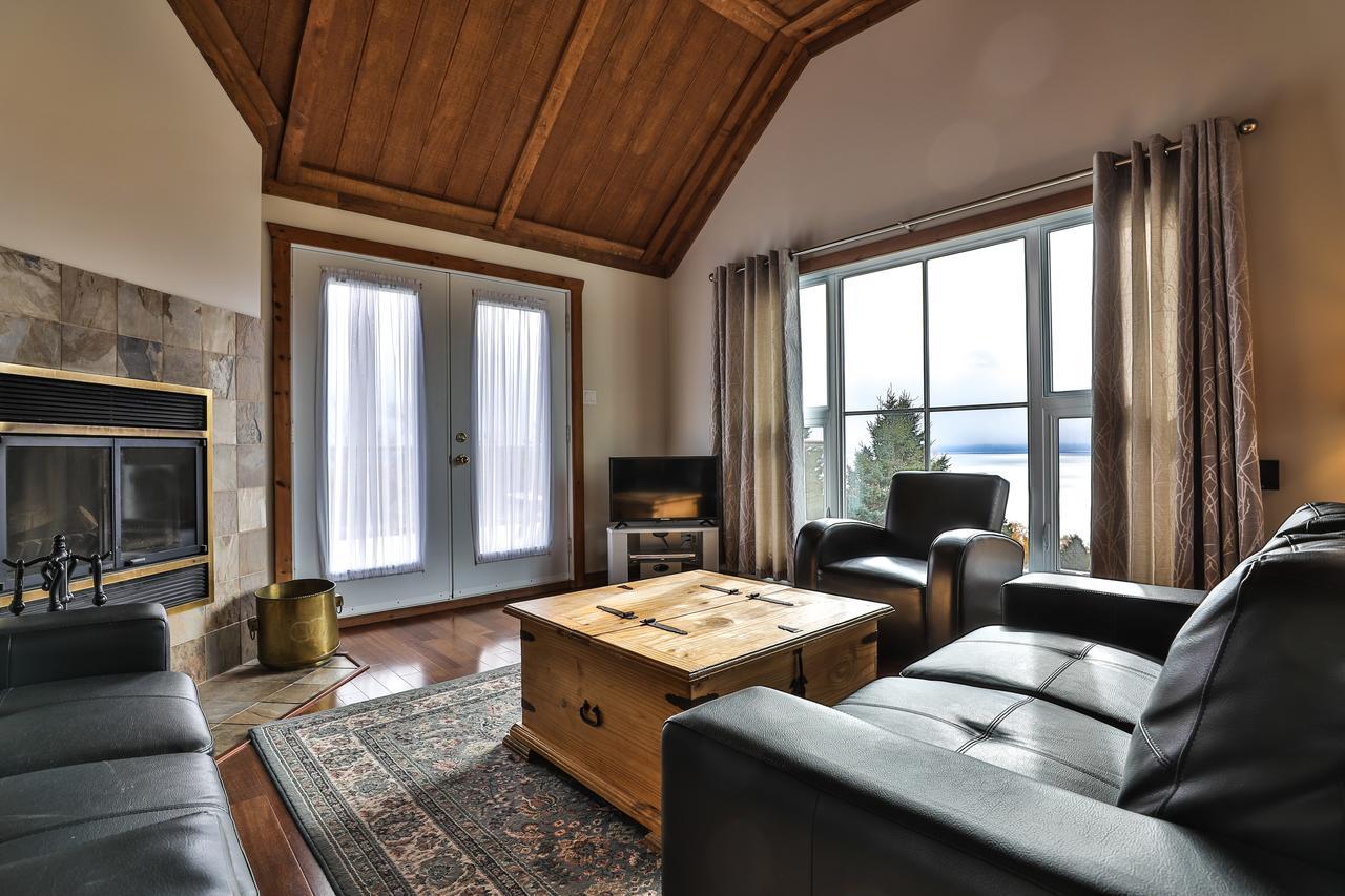 Вилла Les Sommets Charlevoix Петит-Ривьер-Сен-Франсуа Номер фото